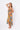 Back view of floral multicolor yellow Kate Reversible Lattice Back Midi Dress lattice back styling resort