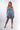 Front view of blue Jen V-Neck Empire Waist Knit Dress A-line silhouette defined waist resort