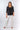 Front view of black Aly 46115 Sleeve Lattice Neck Knit Top relaxed shape easy fit coastal