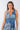 Close-up of silky-soft knit on blue Amy Above-Knee V-Neck Empire Waist Knit Dress chrysanthemum print cool-toned