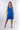 Front view of blue Amy Above-Knee V-Neck Empire Waist Knit Dress A-line defined waist resort