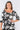 Close-up of silky-soft knit on floral black white Isabel 46115 Sleeve Square-Neck Knit Tunic Top print placement