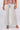 Close-up of silky-soft knit on cream off-white Jenna Relaxed Leg Knit Pants smooth texture wide-leg finish