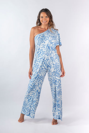 Front view of multicolor light blue white Gigi Asymmetrical One-Shoulder Knit Jumpsuit one-shoulder silhouette resort