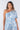 Close-up of silky-soft knit on multicolor light blue white Gigi Asymmetrical One-Shoulder Knit Jumpsuit print varies