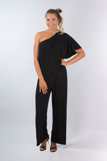 Front view of black Gigi Asymmetrical One-Shoulder Knit Jumpsuit one-shoulder silhouette relaxed fit resort