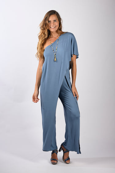Front view of blue Gigi Asymmetrical One-Shoulder Knit Jumpsuit one-shoulder silhouette relaxed fit resort