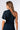 Detail of navy white Lee Asymmetrical One-Shoulder Knit Jumpsuit silky-soft knit one-shoulder finish
