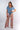 Front view of blue Halle Short Sleeve V-Neck Tie-Front Knit Top relaxed silhouette easy fit coastal