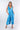Front view of blue tie-dye Christina V-Neck Wide-Leg Knit Jumpsuit wide-leg silhouette relaxed fit resort