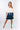 Front view of cream off-white Jodie 46115 Sleeve V-Neck Tie-Front Knit Top relaxed silhouette easy fit coastal