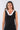 Close-up of silky-soft knit on black Juno Above-Knee U-Neck Knit Dress contrast neckline detail finish