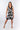 Front view of floral black white Juno Above-Knee U-Neck Knit Dress sheath silhouette contrast trim resort
