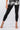 Close-up of silky-soft knit on black Skye Capri Knit Legging smooth texture capri length finish
