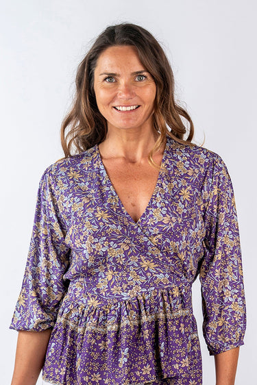 Close-up of super-soft rayon on floral pink Kiera 46115 Sleeve Ruffle Wrap Top print placement varies