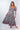 Front view of floral multicolor Ginger Sweetheart Ruffle Maxi Dress sweetheart neckline maxi silhouette resort