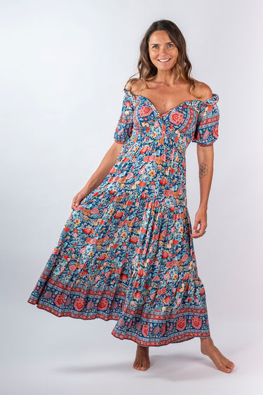 Front view of floral multicolor Ginger Sweetheart Ruffle Maxi Dress sweetheart neckline maxi silhouette resort