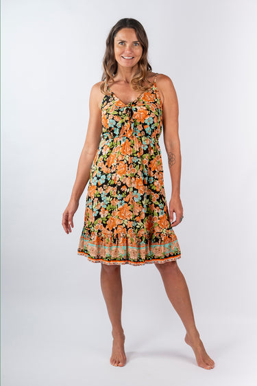 Front view of floral pink Olivia Tie-Front Ruffle Dress relaxed silhouette easy fit resort