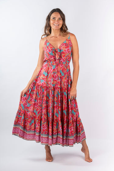 Front view of floral purple pink Sandra Tie-Front Ruffle Maxi Dress maxi silhouette relaxed fit resort