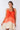 Close-up of super-soft rayon on dip-dye red orange Stella Above-Knee Swing Dress artisanal dip-dye finish