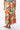 Detail of floral multicolor Ella Wide-Leg Ankle Pants With Pockets super-soft rayon wide-leg finish