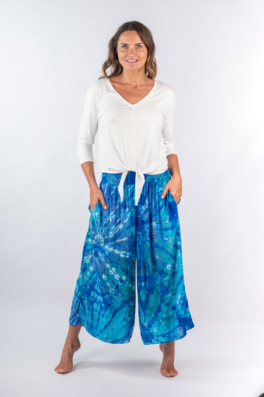 Front view of blue green tie-dye Ella Wide-Leg Ankle Pants With Pockets relaxed wide-leg silhouette resort
