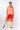 Front view of dip-dye red orange Josephine Mock Wrap Pants relaxed wide-leg silhouette easy fit resort