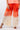 Close-up of super-soft rayon on dip-dye red orange Josephine Mock Wrap Pants artisanal dip-dye finish