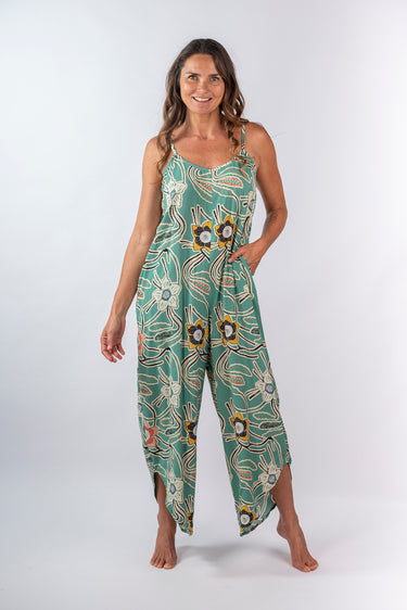 Front view of floral mint Chloe V-Neck Jump Suit With Pockets one-piece silhouette relaxed fit resort