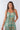 Close-up of super-soft rayon on floral mint Chloe V-Neck Jump Suit With Pockets print placement varies