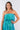 Close-up of super-soft rayon on green tie-dye blue Ivy Strapless High-Low Midi Dress artisanal tie-dye finish