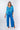 Front view of cobalt blue Nina Straight Leg Pants With Slits relaxed straight-leg silhouette resort