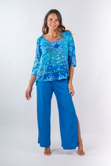 Front view of cobalt blue Nina Straight Leg Pants With Slits relaxed straight-leg silhouette resort