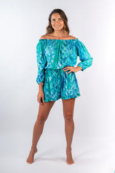 Front view of green tie-dye blue Anya Convertible Off-Shoulder Romper one-piece silhouette relaxed fit beachside