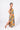 Back view of floral multicolor yellow Laura Empire Waist Maxi Dress With Slits empire waist resort