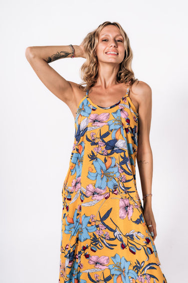 Side view of floral multicolor yellow Kate Reversible Lattice Back Midi Dress fluid drape relaxed fit coastal