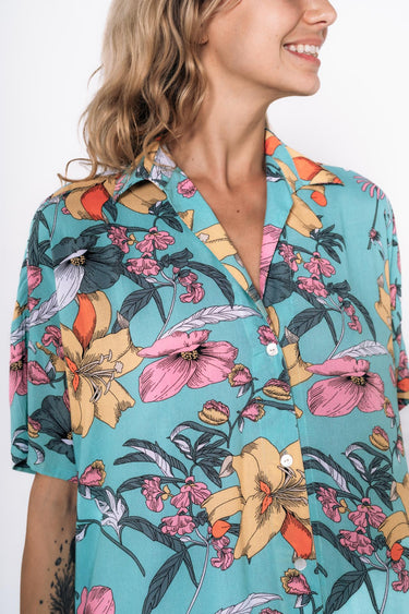 Side view of floral multicolor Tess Button Front Maxi Tunic Dress fluid drape relaxed fit coastal
