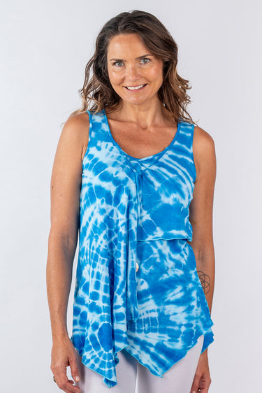 Close-up of silky-soft knit on blue tie-dye Simone Sleeveless Draped Knit Top artisanal tie-dye finish