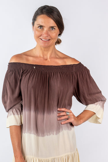 Close-up of super-soft rayon on brown rose gold Amber Convertible Off-Shoulder Ruffle Mini Dress hand-dipped ombre finish