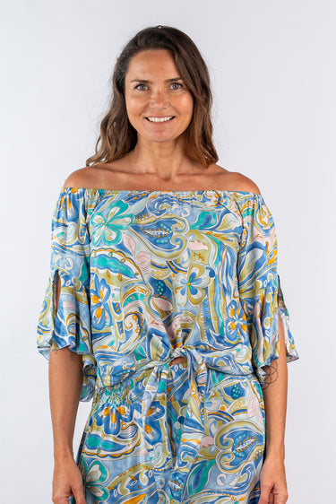 Close-up of super-soft rayon on floral multicolor Joy Convertible Off-Shoulder Ruffle Sleeve Top print placement varies