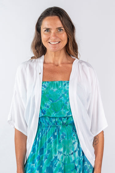 Close-up of super-soft rayon on white Sienna 46115 Sleeve Butterfly Wing Shrug smooth texture finish