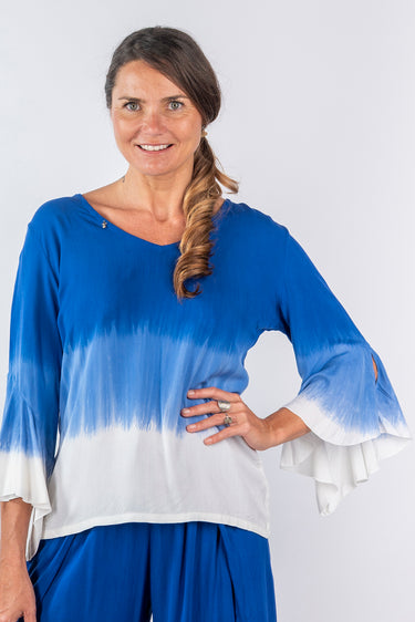 Close-up of super-soft rayon on blue Lily V-Neck 46115 Sleeve Ruffle Top ruffle detail finish