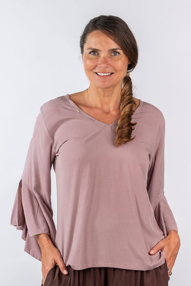 Close-up of super-soft rayon on red orange dip-dye Lily V-Neck 46115 Sleeve Ruffle Top artisanal finish