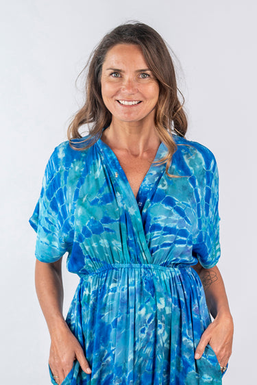 Close-up of super-soft rayon on blue green tie-dye Greta Short Sleeve Maxi Dress With Pockets artisanal tie-dye