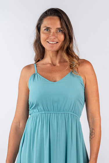 Close-up of super-soft rayon on mint green Darcy Above-Knee Empire Waist Dress empire waist draped finish